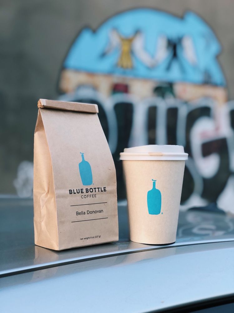 coffee essential; blue bottle coffee and bag of beans