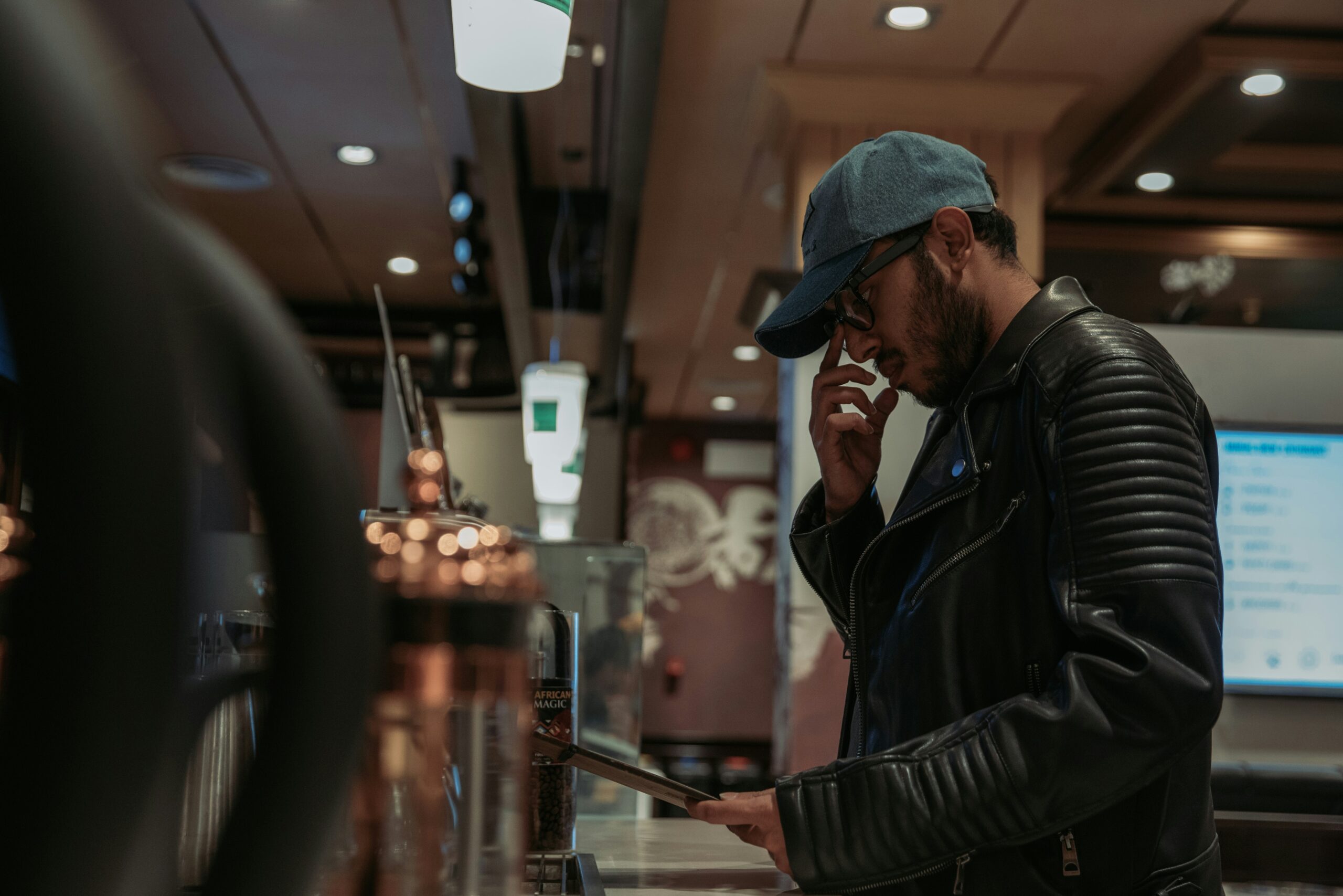 coffee for beginners, man choosing coffee at the register